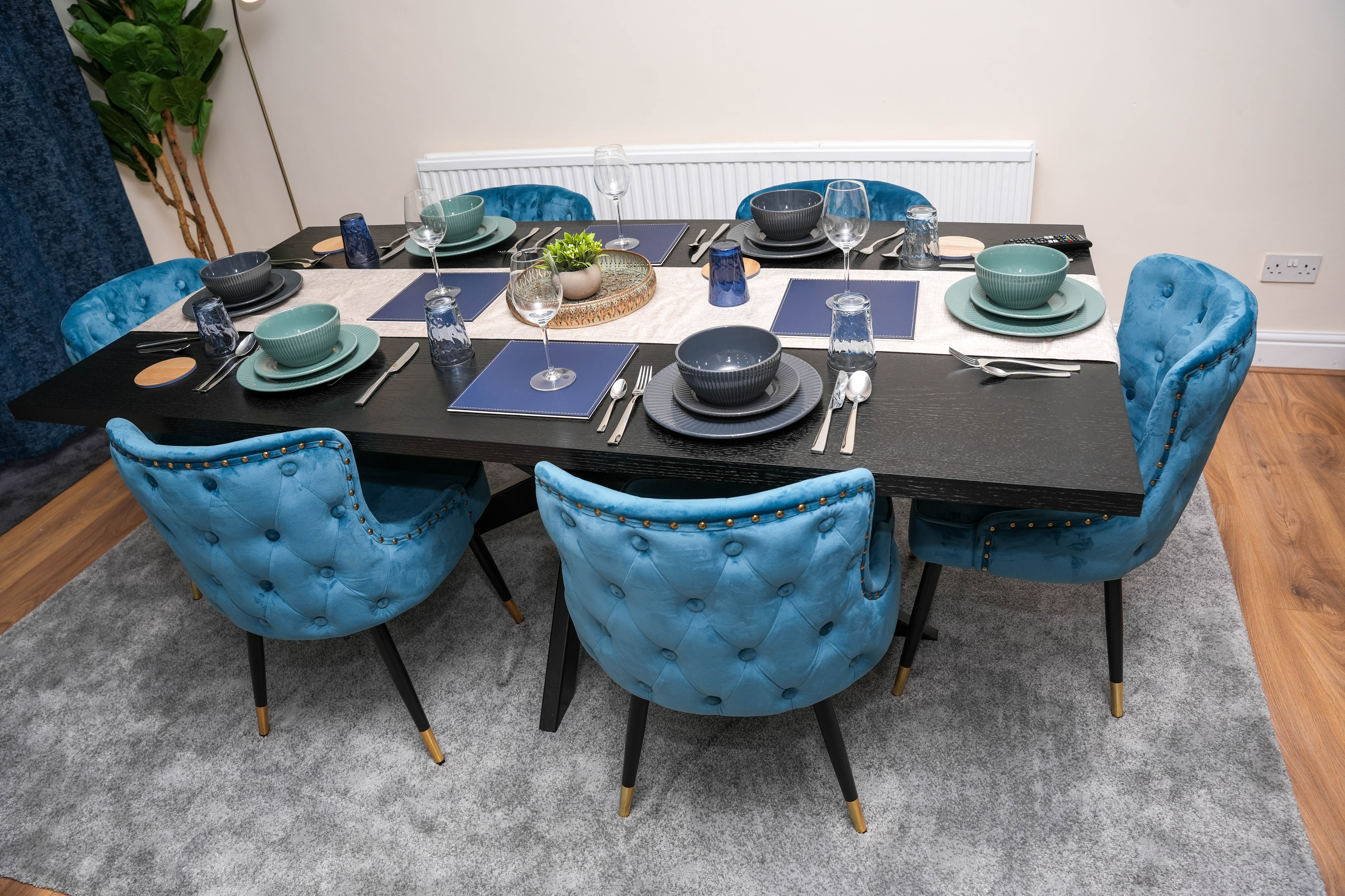 Dining table in the living room at the Hounslow 4-Bedroom Home
